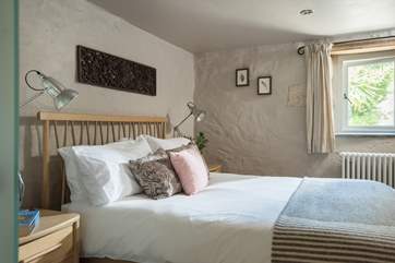 Calm colours throughout this lovely bedroom at the front of the cottage.