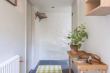 The bedrooms and the bathroom can be found on the ground floor.