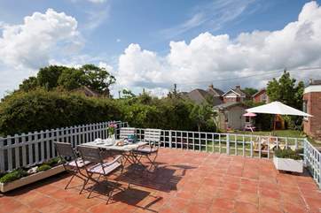 The raised patio-area over looks the lovely garden