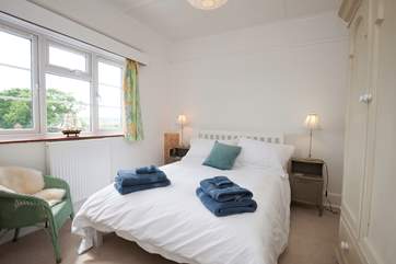 The second double bedroom, on the first floor, also benefits from stunning sea views