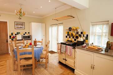 The light dining-area/kitchen is a great space for families to spend time together whilst cooking and eating.