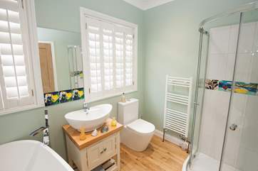 The bathroom on the ground floor has a bath for a lovely soak and shower for a quick morning wake up
