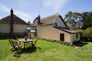 This is the back of the cottage so you can see that the garden is not overlooked at all. There is a small drop from this part of the garden to the garden path at the back of the cottage so do take car