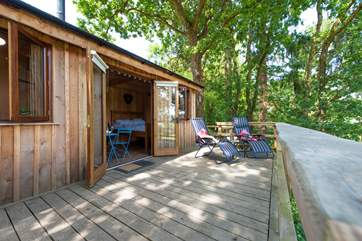 The spacious deck is the perfect place to relax and take in the views.