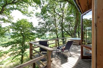 There are sun-loungers on the decking, perfect for relaxing on with a good book.