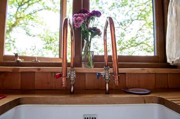 There are also gorgeous copper taps in the kitchen area.