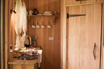 The kitchen is well-equipped with lovely hand crafted features.