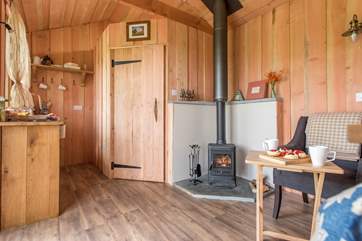The living space is open plan and the spacious en suite shower-room is through the door.