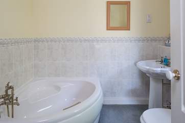 En suite to master bedroom. Comprises of a bath and a shower cubicle.