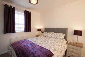 On the second floor is this lovely master bedroom, complete with mirrored wardrobes and TV for those lazy morning lie-ins