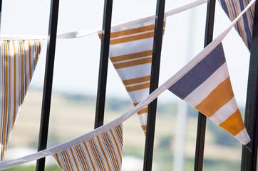 Bunting beautifully decorates the balcony