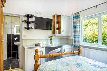 The bedroom has direct access to the bathroom.