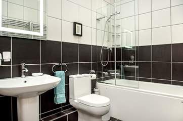 The stylish bathroom - complete with a jacuzzi bath.