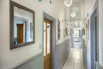 All rooms lead off a central corridor.
