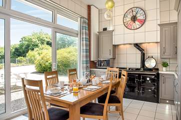 The stylish kitchen/dining-room with a fabulous five oven range cooker.