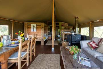The delightful living area is open plan, complete with cosy cabin bed.