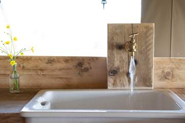 There is cold running water supplied to the kitchen sink.