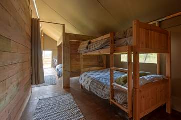 The other pretty bedroom has bunk-beds.
