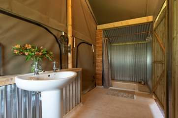 Complete with running water and a proper flushing loo - this is glamping after all!