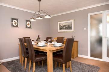 The dining-area leads off from the kitchen and there is plenty of room for all to gather at meal times.