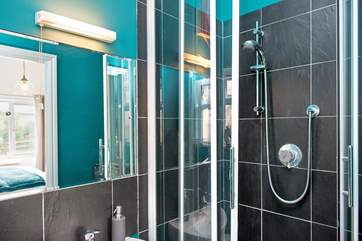 Bedroom 1 has an en suite shower-room.
