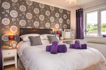 All four bedrooms are brightly decorated.