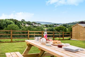 The garden is south-facing, perfect for al fresco dining.