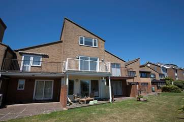 With private patio and balcony and a shared lawn area, there is plenty of outside space to enjoy the Island sunshine