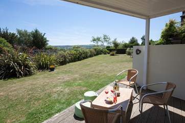 Enjoy the gorgeous summer sunshine on the patio looking out to River Yar