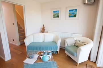 In the dining-room there is cosy seating, a lovely spot for your morning coffee