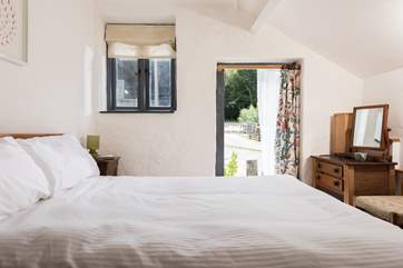 This double bedroom also has a door out onto the courtyard behind.