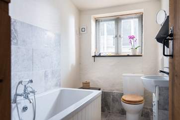 The second bathroom is between the two double bedrooms.