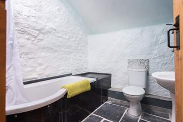 The bathroom at the end of the hall.