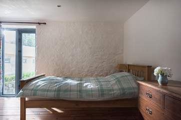 The second twin bedroom is slightly bigger than this one but both are calm relaxing spaces (photo to follow).