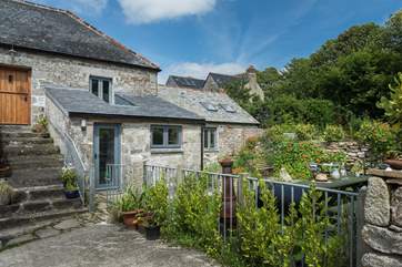 The original stone steps lead up to the sitting-room.