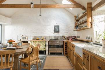 The hand-built kitchen and local pottery bring a real warmth and personality to the space.