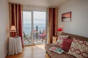The snug with doors out to the balcony