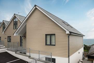 The entrance to the apartment is on ground level and there is a parking space right in front.