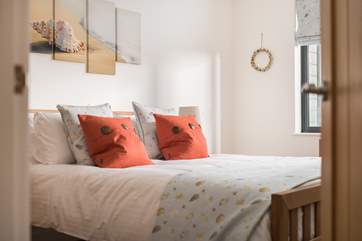 The two bedrooms are beautifully furnished.