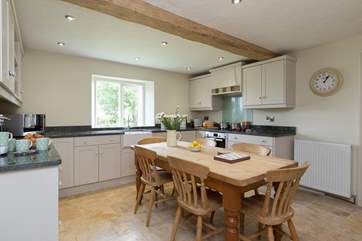 The kitchen is really well-equipped and there is a separate utility-room too so there is plenty of storage space in the kitchen for you.