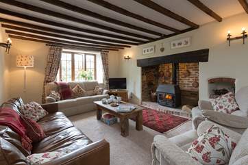 There is a large but very cosy farmhouse sitting-room to come back to after a lovely day out exploring. There is a comfy chair in the second kitchen/dining room that can be brought into this room for