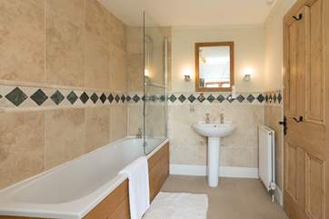 There are two lovely new bathrooms on the first floor. One is almost like an en suite for Bedrooms 5 and 6 and the other is the family bathroom for the rest of the house.