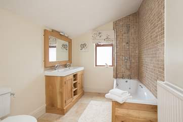 The brand new bathroom is on the ground floor... it is off the entrance hall and there are a couple of steps from it down to the living area.