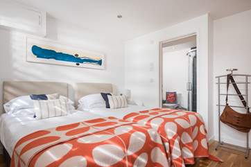 Bedroom 2 shown made up as a twin room.