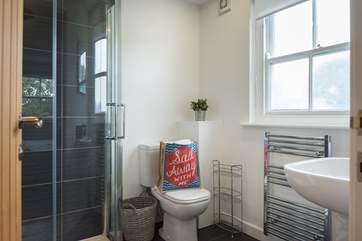 The en suite shower-room for Bedroom 1, spacious and light.