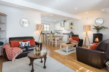 The spacious, light-filled open plan living-room.