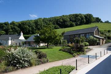 Looking back across at Little Coombe Cottage, Little Coombe Barn and the owner's main house. Both properties would prove an amazing set-up for a larger group holiday.
