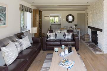 Open plan living area makes it easy to enjoy each other's company whether your cooking supper, laying the table or simply relaxing watching television.