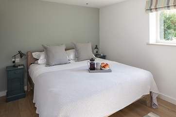 Stunning super-king size bed in the master bedroom.