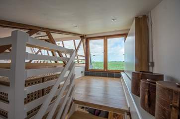 The first floor mezzanine bedroom has a 4' bed which can be closed or dropped down to use (see box on the right-hand side of the picture).